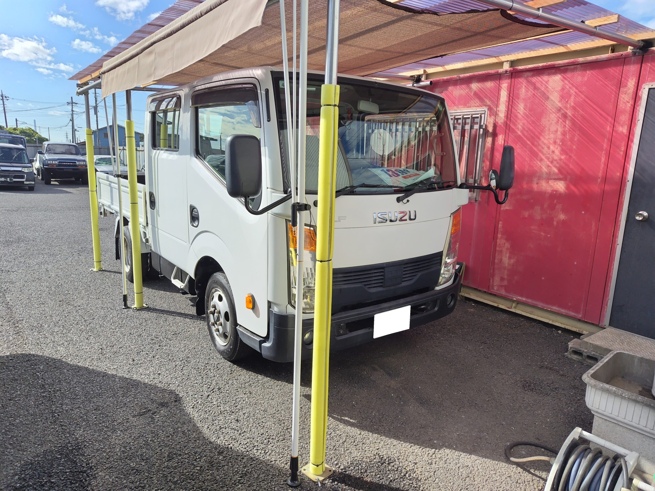 いすゞエルフ　エアコンとオルタネーターの修理です。